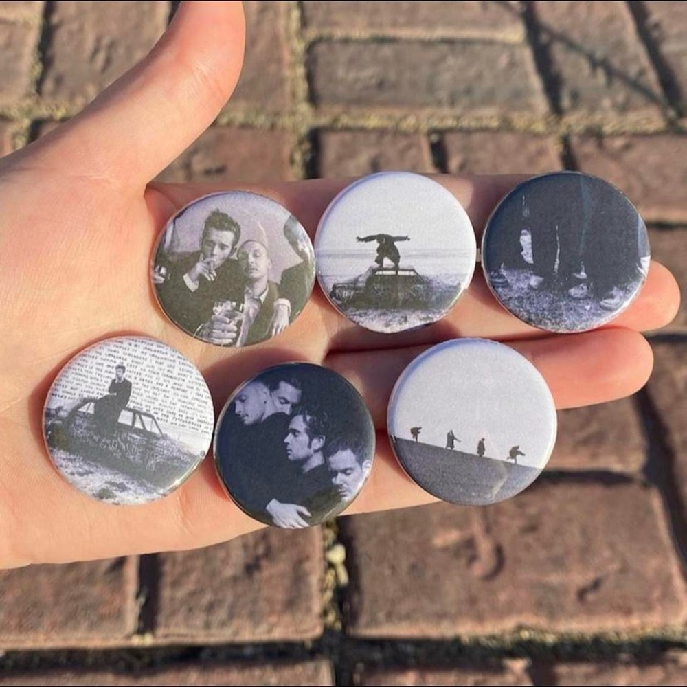 The 1975 pin set